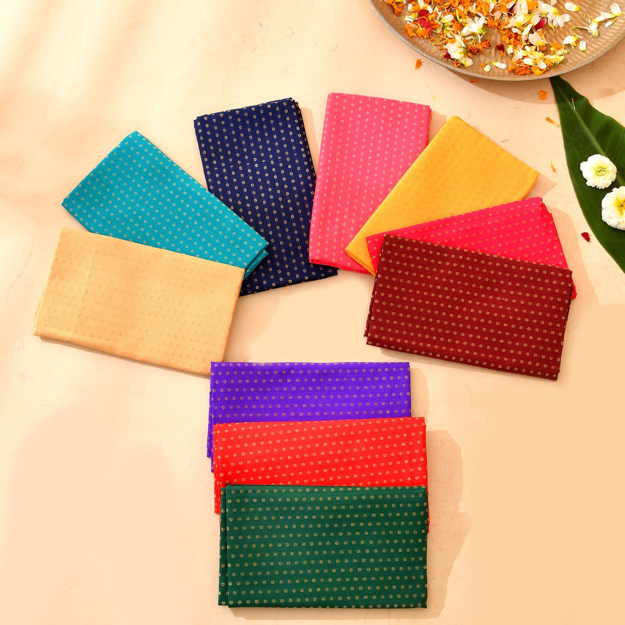 A collection of unstitched floral multicolor blouse pieces in vibrant patterned fabric for saree and Indian gifts