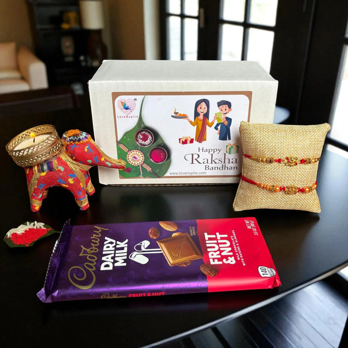 Rakhi Gift Hamper for Brother Bhabhi Raksha Bandhan Set of 2 Ganesha Bracelet Rakhis with Roli Chawal Rakhi Stickers Gift Box Bhaiya Sister In Law Traditional Rakhi Combo - LoveNspire