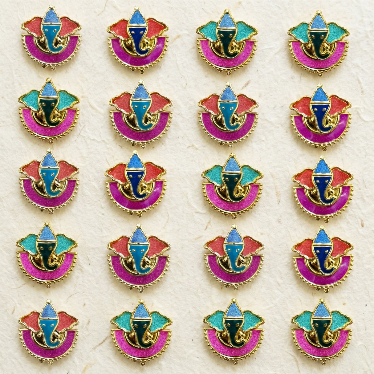 Colorful enamel ganesha-themed pin badges with gold-tone metal edges and glittery finish for indian festival favors