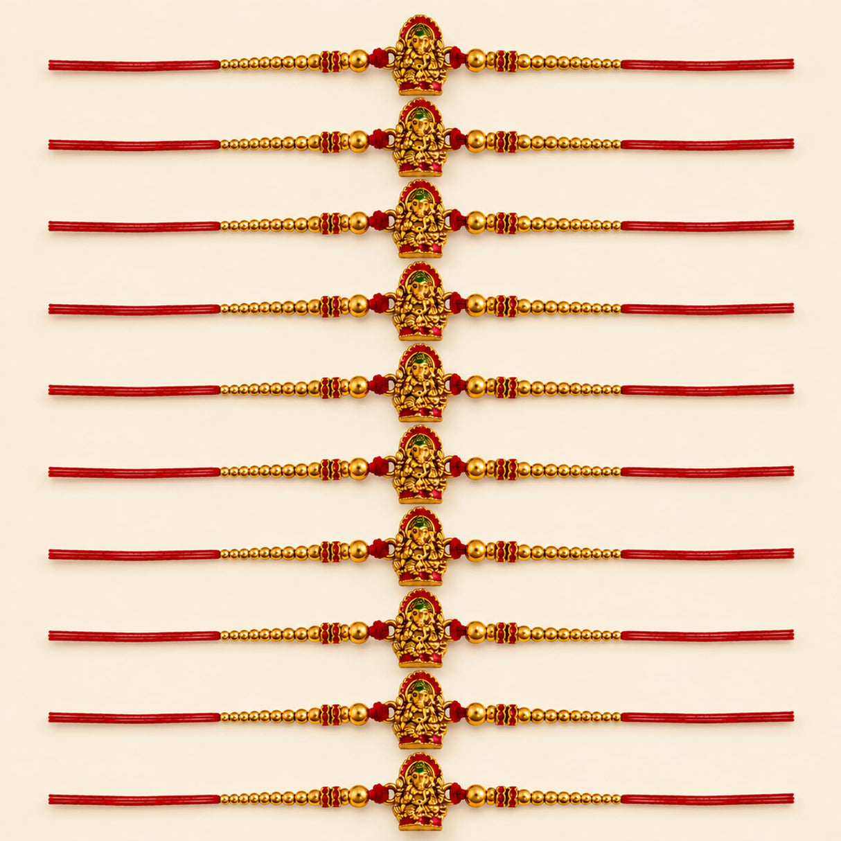 Handcrafted ganesha rakhi bracelet set with golden lord ganesha, red and gold beads, green gemstones, adjustable thread for raksha bandhan