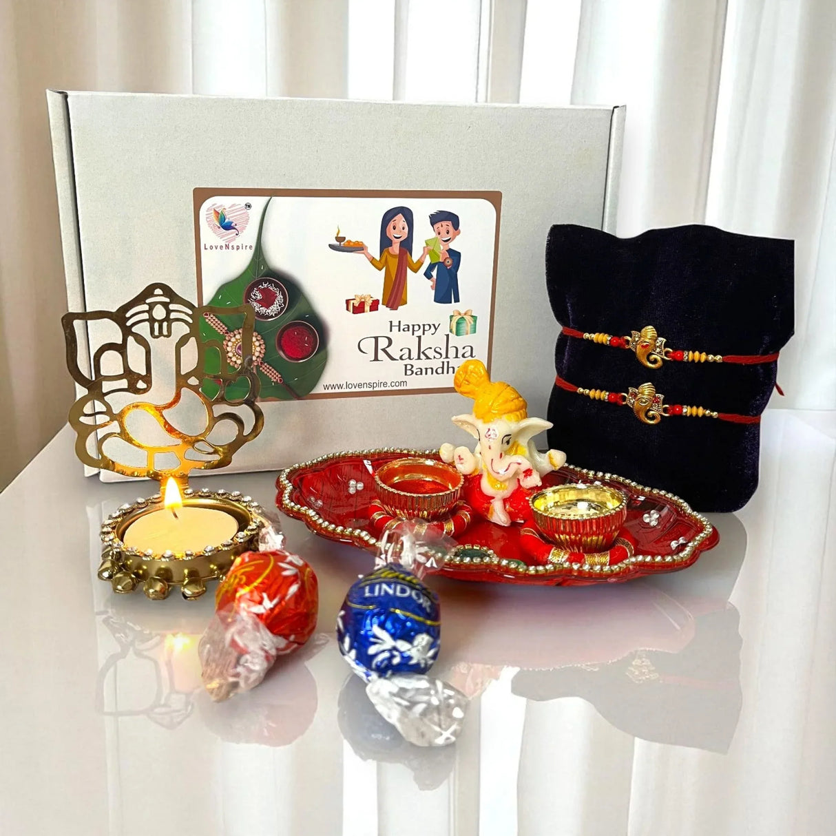 Ganesha Rakhi Gift Hamper with Gift Box Set of 2 Rakhi with Traditional Puja Plate Roli Chawal Candle Holder - Raksha Bandhan Bracelet Rakhi for Brother Bhai Bhabhi Sister-In-Law - LoveNspire