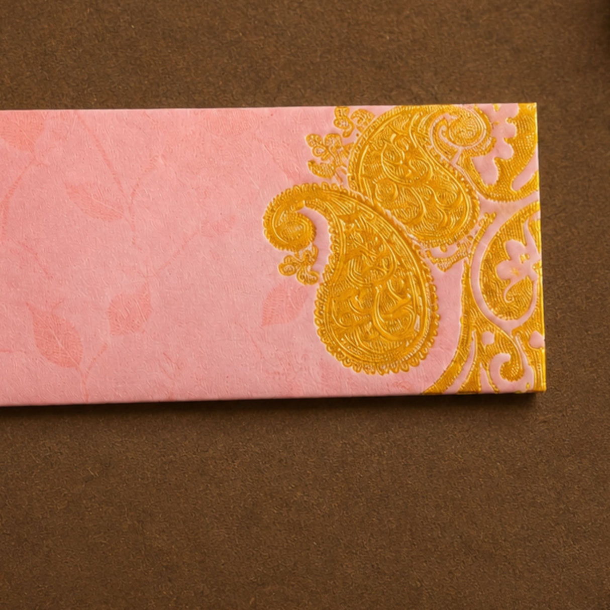 Pink textured money envelope with gold embossed paisley design for indian wedding cash gifts and savings organizer