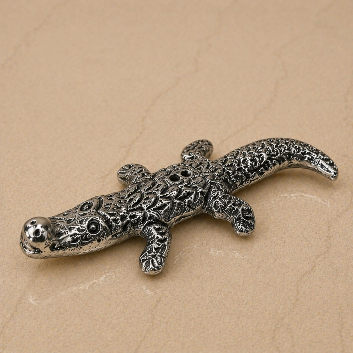 Minimalist silver plated alligator shaped incense stick holder with detailed engravings for temple and living room use