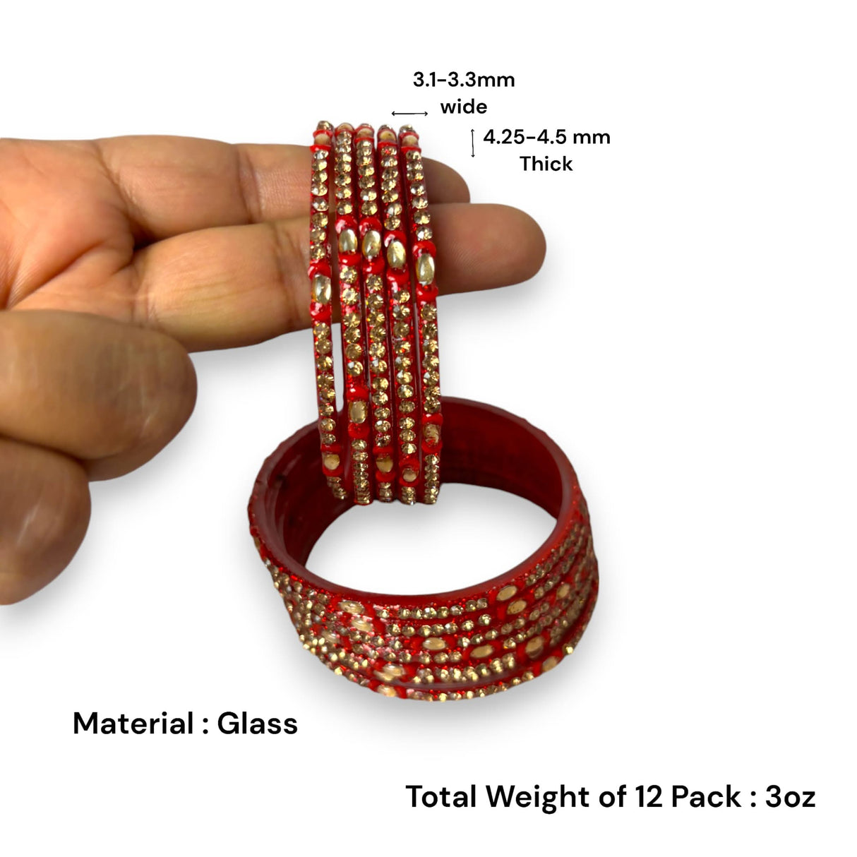 Red and gold glass bangles from Indian jewelry set for wedding and festive occasions