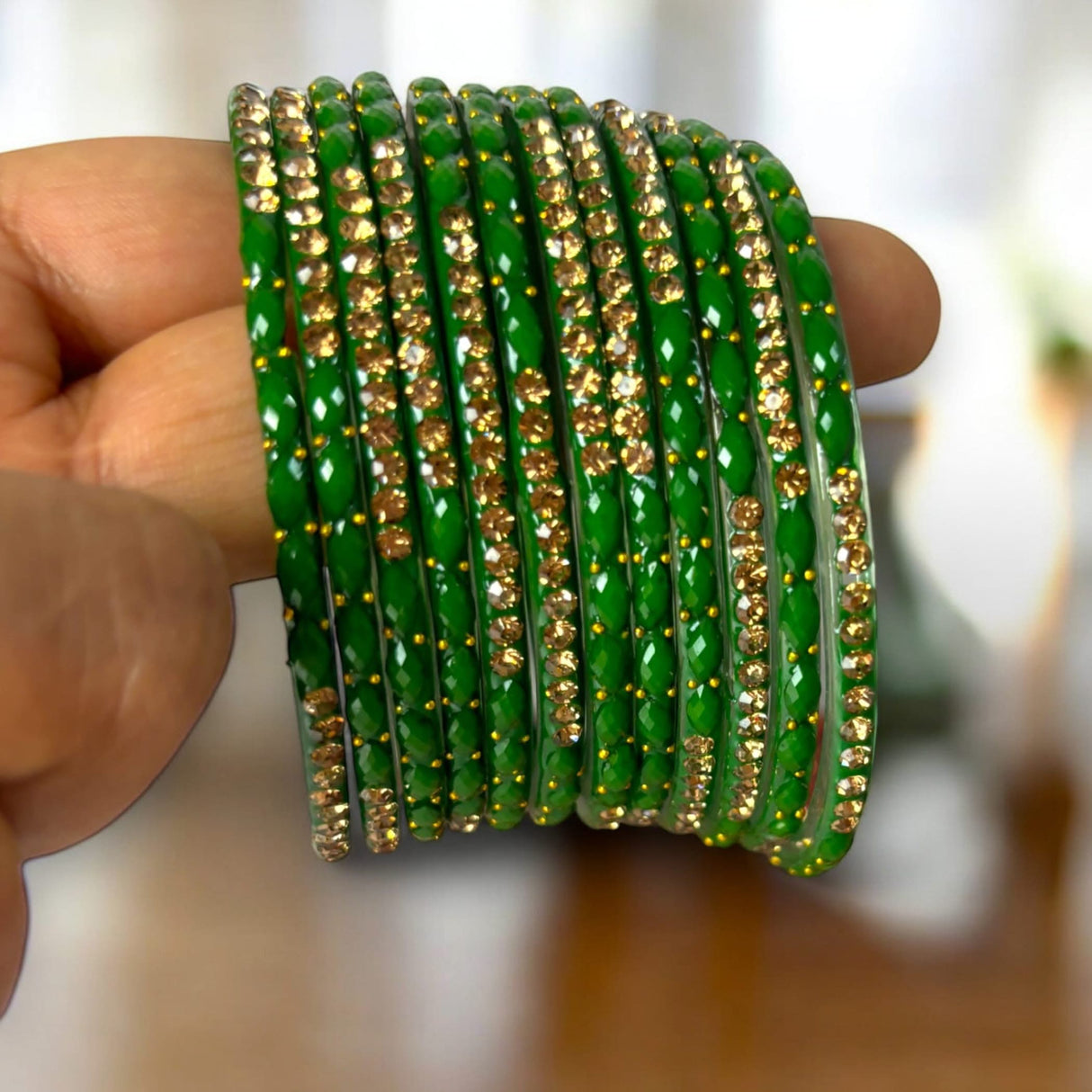 Green and gold glass bangles set for Indian wedding, festival, and ethnic occasions
