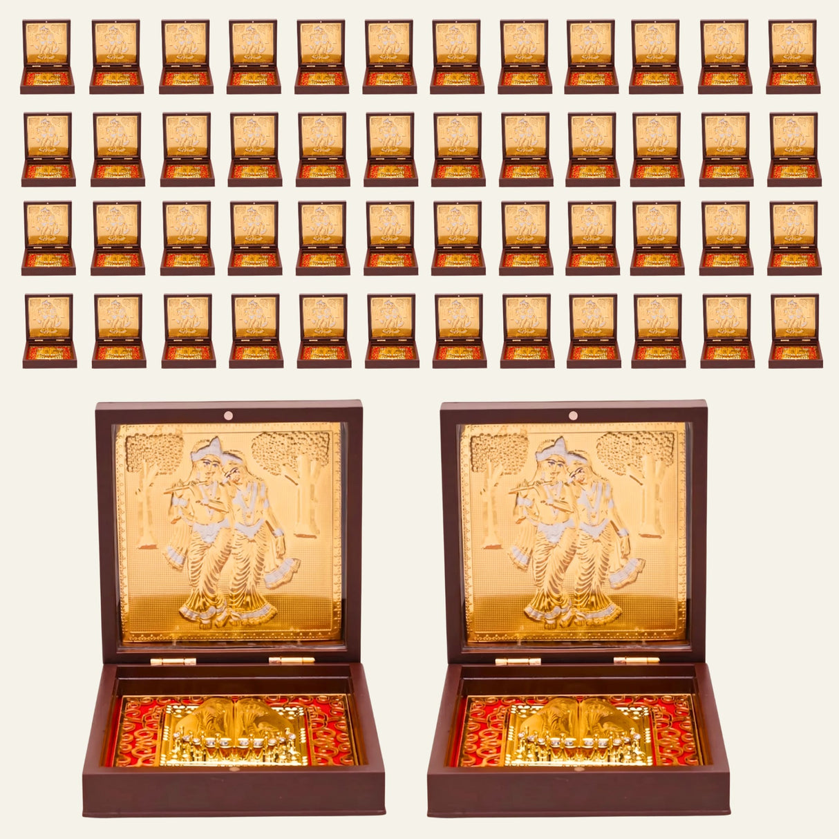 Gold plated radha krishna photo frame with intricate embossed couple design in golden box with red patterned interior