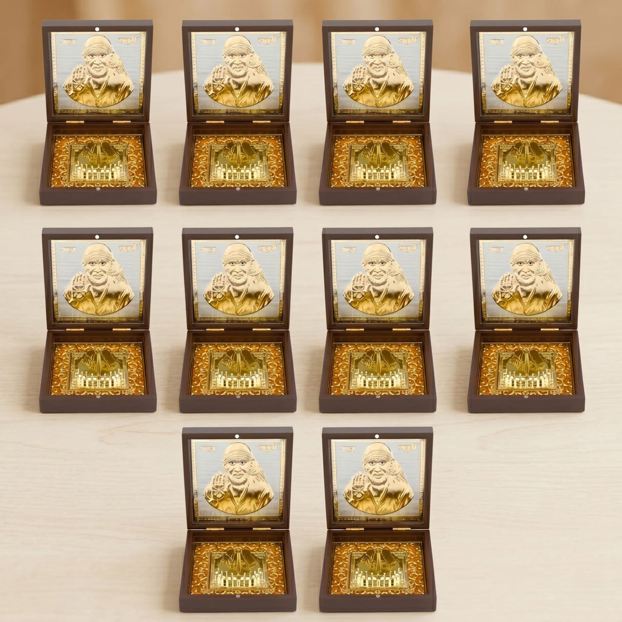 Gold plated sai baba photo frame with golden metallic portrait and charan paduka in dark brown wooden box with gold foil lining