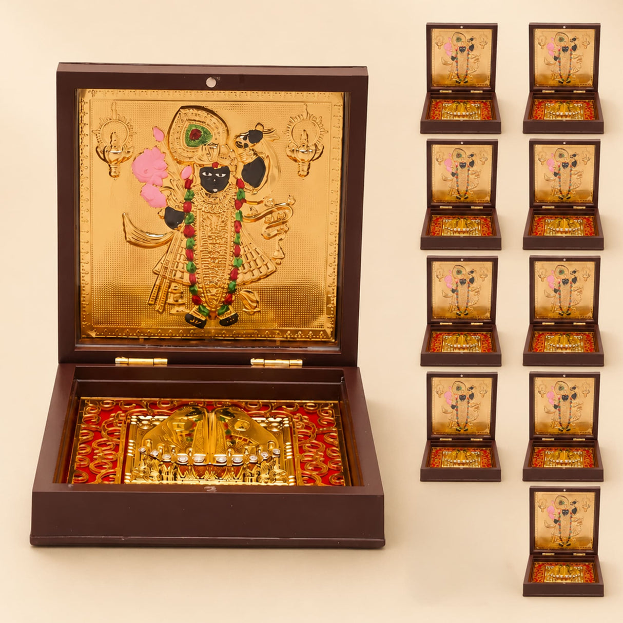 Gold plated Shrinath Krishna deity figurine in an ornate dark wood box with red velvet lining for spiritual decor