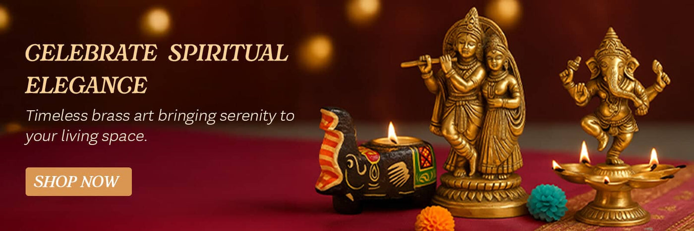 Golden brass ganesha statue with intricate details and a serene expression.