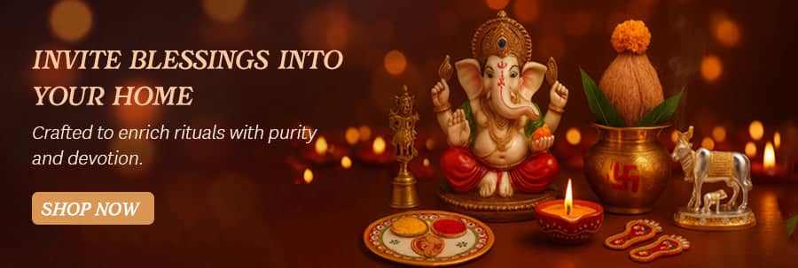 Golden elephant statue with red and green accents, crafted from ceramic.