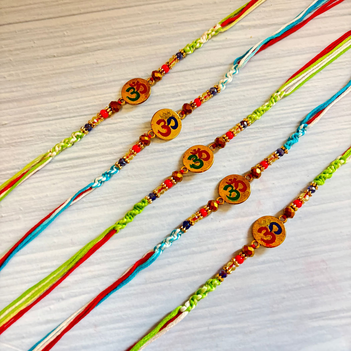 Religious Om Rakhi for Brother & Bhabhi – Handcrafted Adjustable Thread Bracelet, Protection & Good Luck Gift for Raksha Bandhan