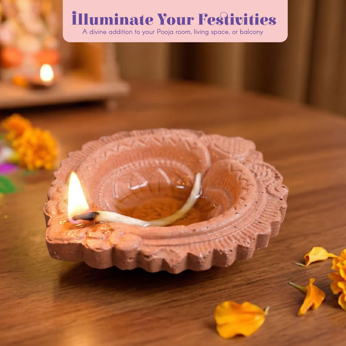 Terracotta-colored handmade clay diya with intricate embossed patterns and a lit wick for pooja and diwali decor
