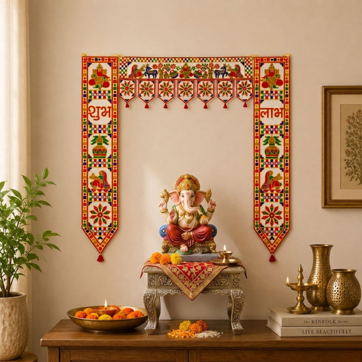 A vibrant red and gold embroidered fabric ganesha door toran with shubh labh for traditional Indian home décor