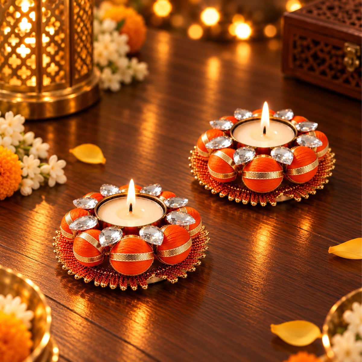 Two pack decorative orange and gold tea light candle holders with clear crystal accents for diwali pooja and home decor