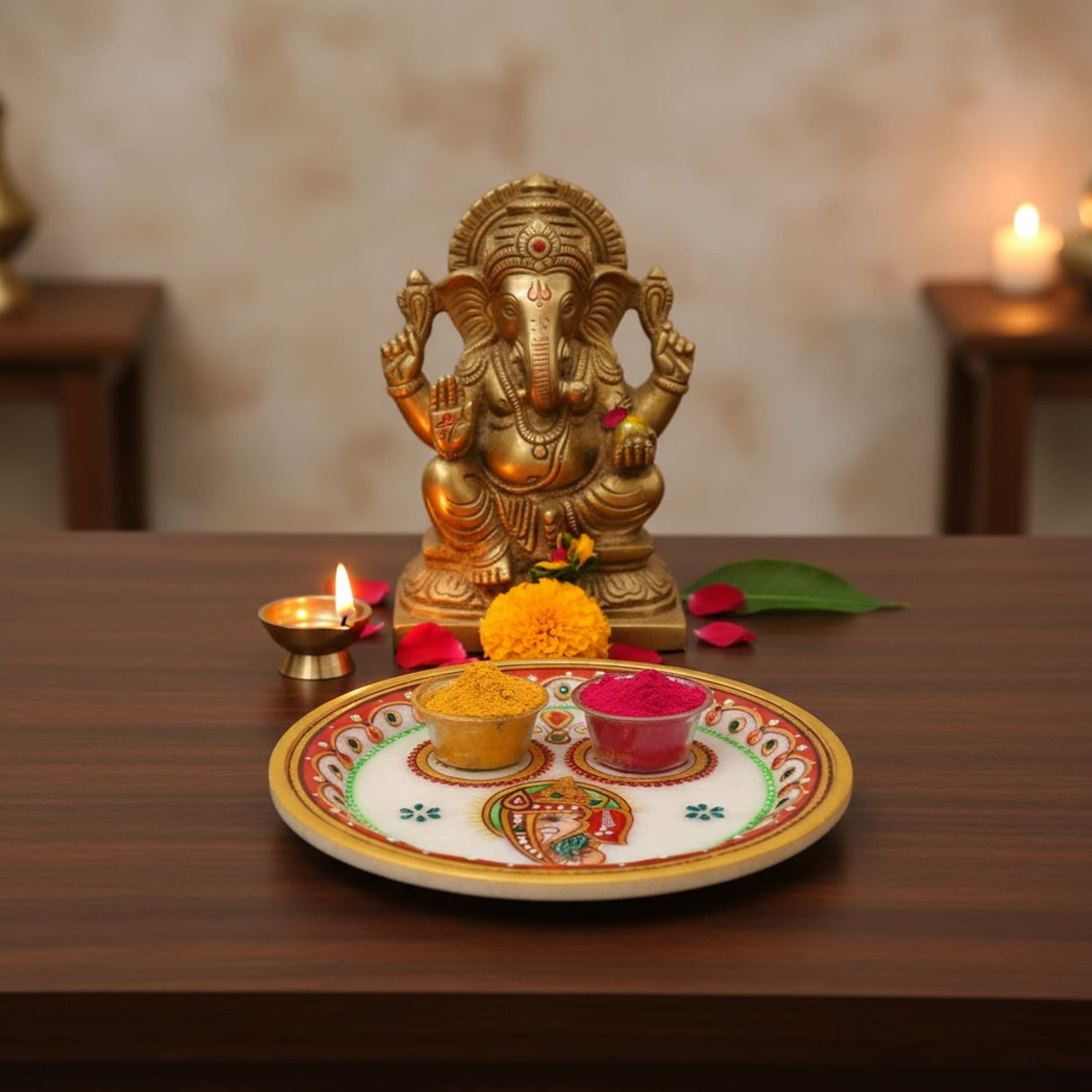 Golden elephant statue with intricate details and red accents on white marble base for Pooja decor