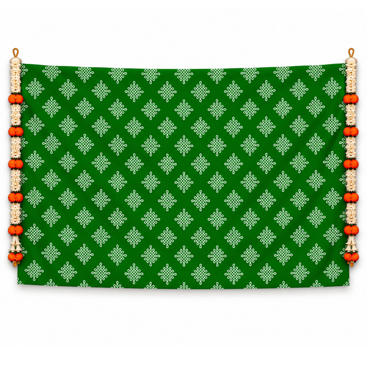 Green kolam rangoli print backdrop with white geometric patterns and orange white beaded tassels for Diwali decor