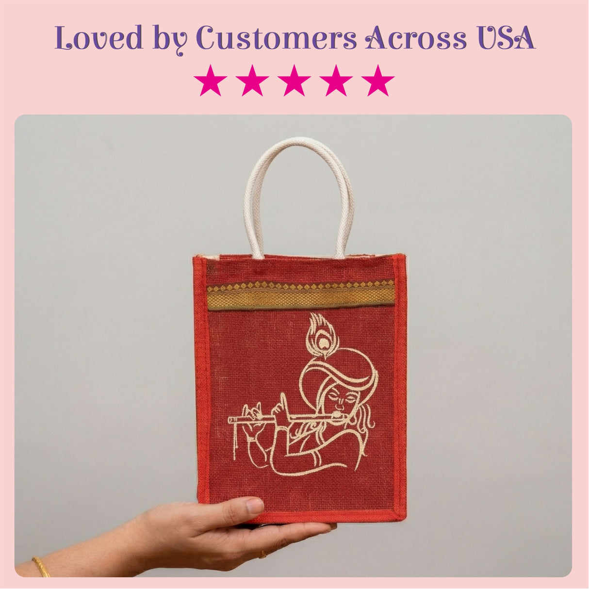 Red jute tote bag with white embroidered krishna flute player design and gold trim for indian wedding favors and gifts
