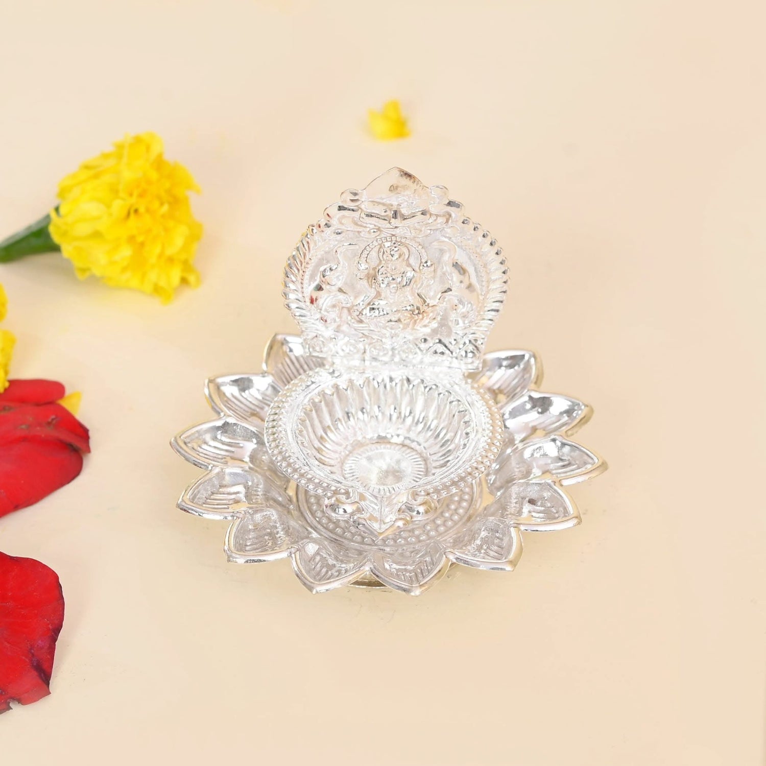 Ornate silver diya lamp frontal view for Diwali decoration and Hindu puja rituals
