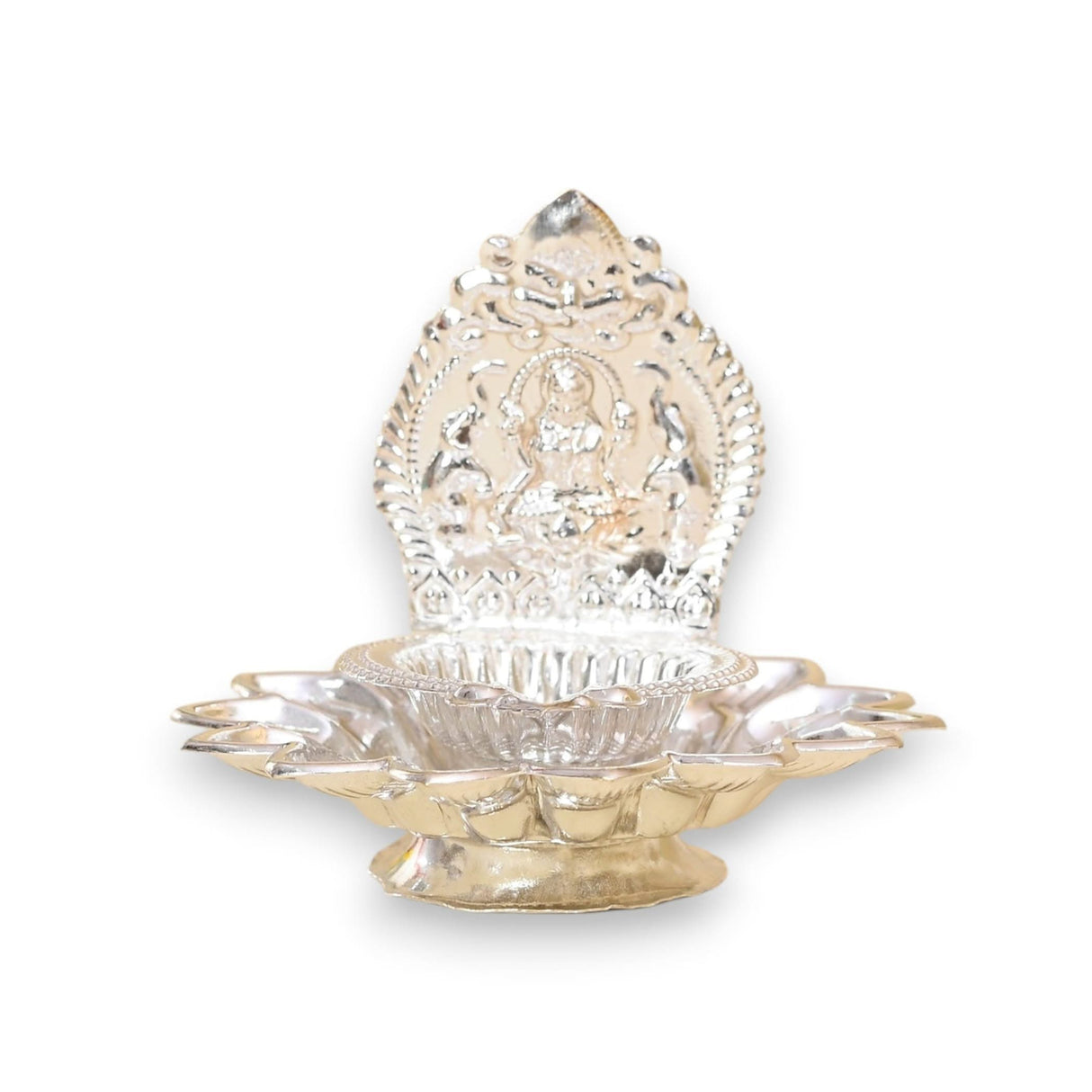 Ornate silver oil lamp for Hindu puja and Diwali celebrations reflecting traditional craftsmanship