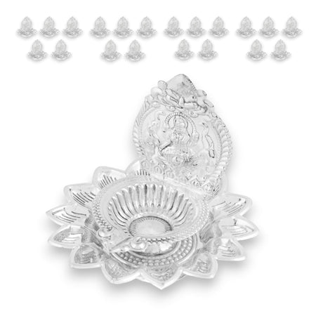 Silver lotus diya with deity relief for Hindu puja and Diwali home decoration