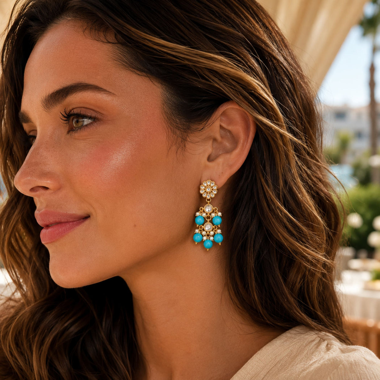 Turquoise and gold Indian floral kundan stone and faux pearl chandelier earrings for women ethnic wear and weddings