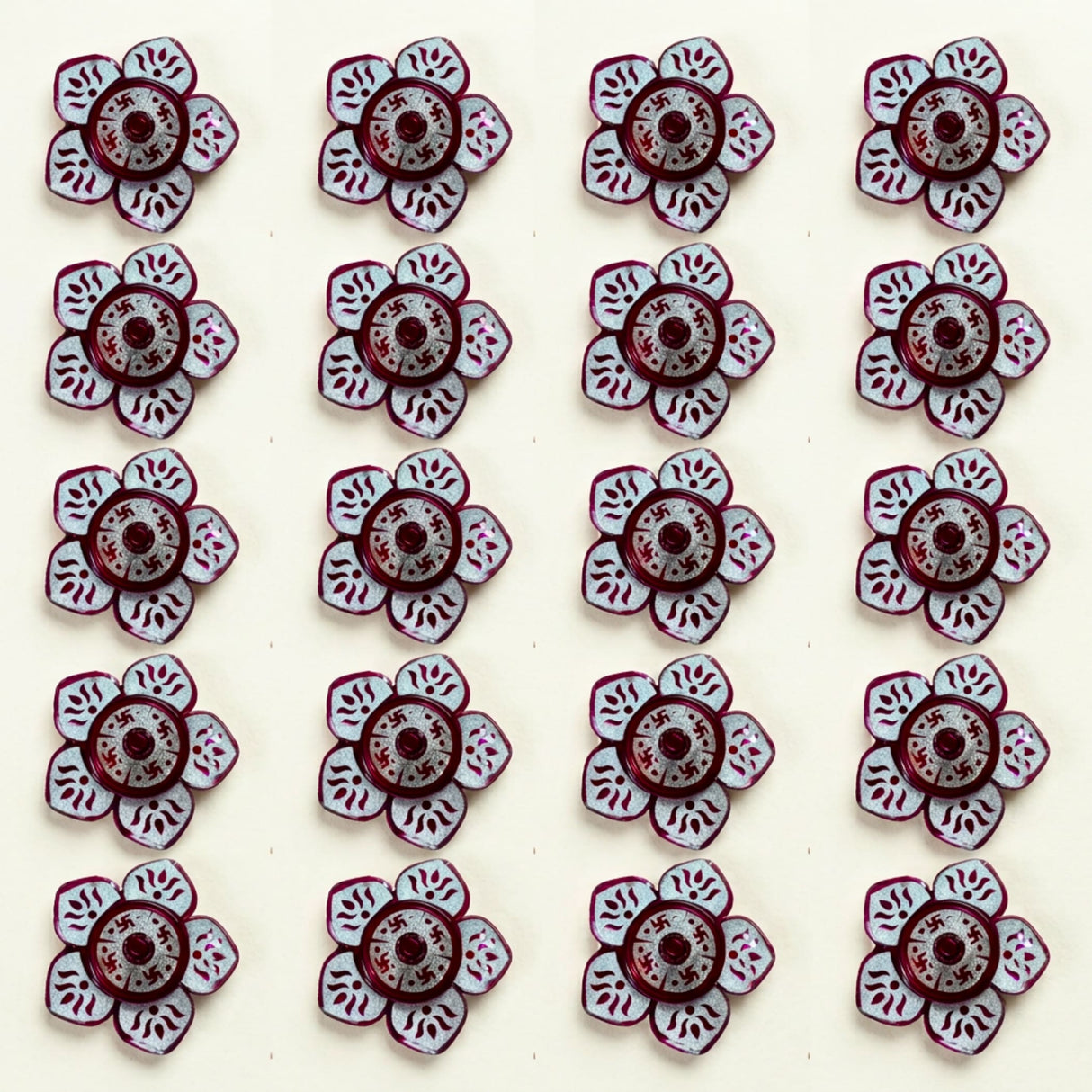 Maroon and white floral lotus haldi kumkum holder with intricate swastika patterns for pooja and Diwali decor