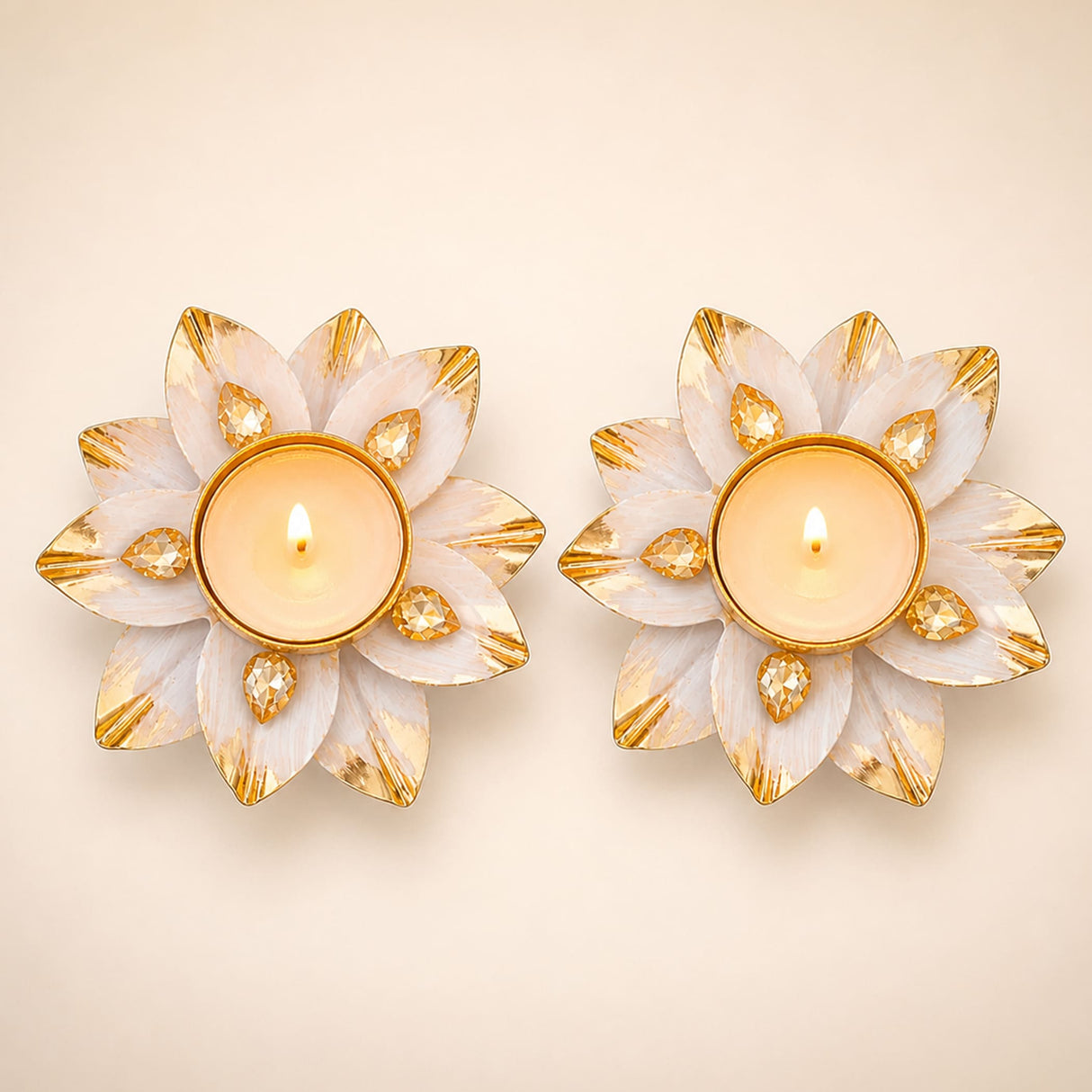 White and gold lotus-shaped tealight candle holders with faceted crystal accents for diwali pooja and home decor