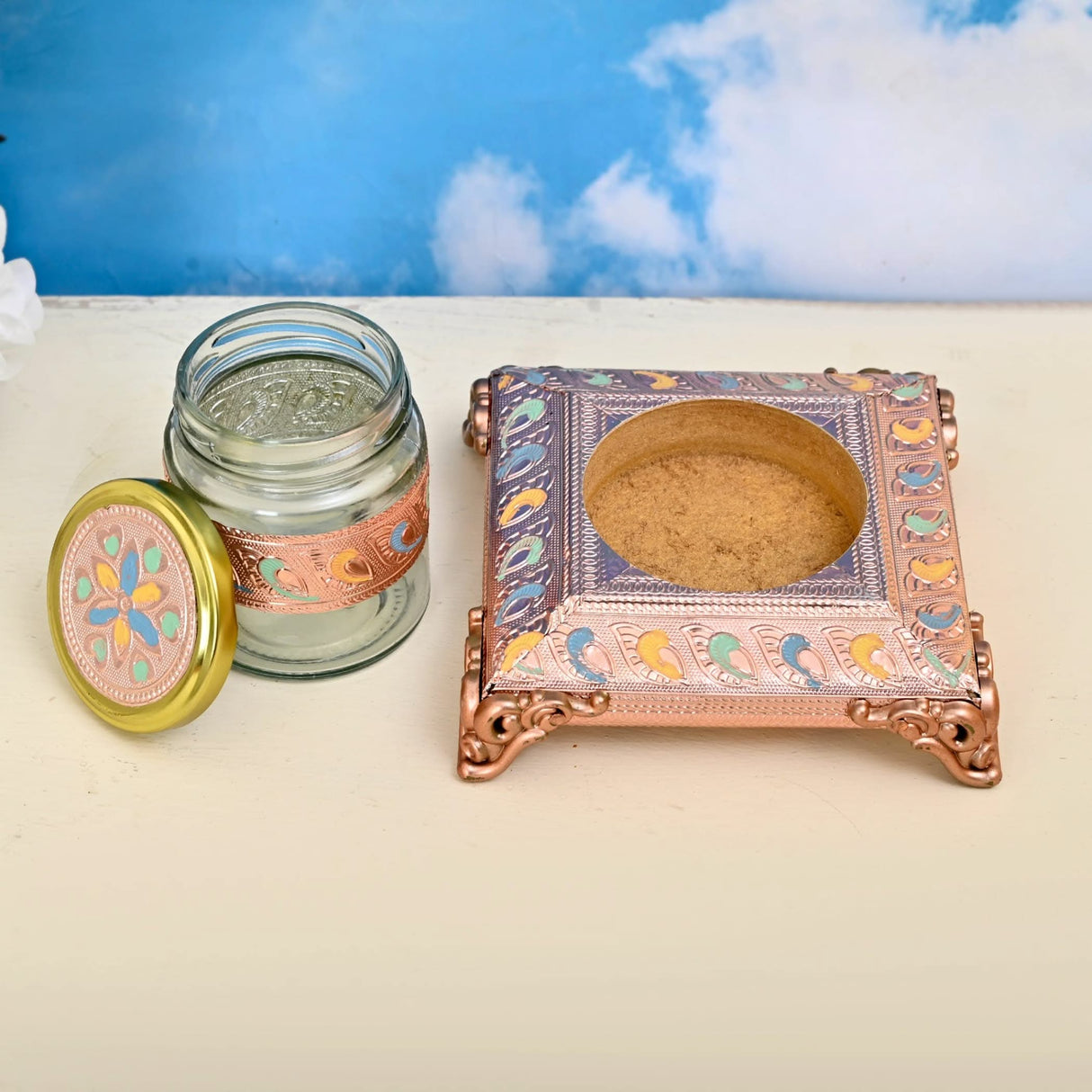 Ornate glass jar and decorative box for dry fruits and sweets in elegant design