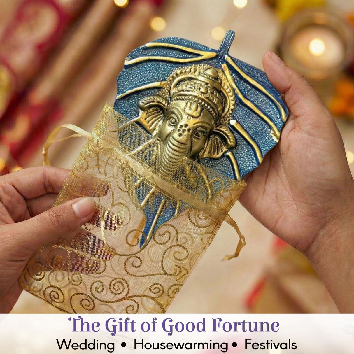 Blue gold Ganesh leaf textured pouch held in hands, Diwali gift pack