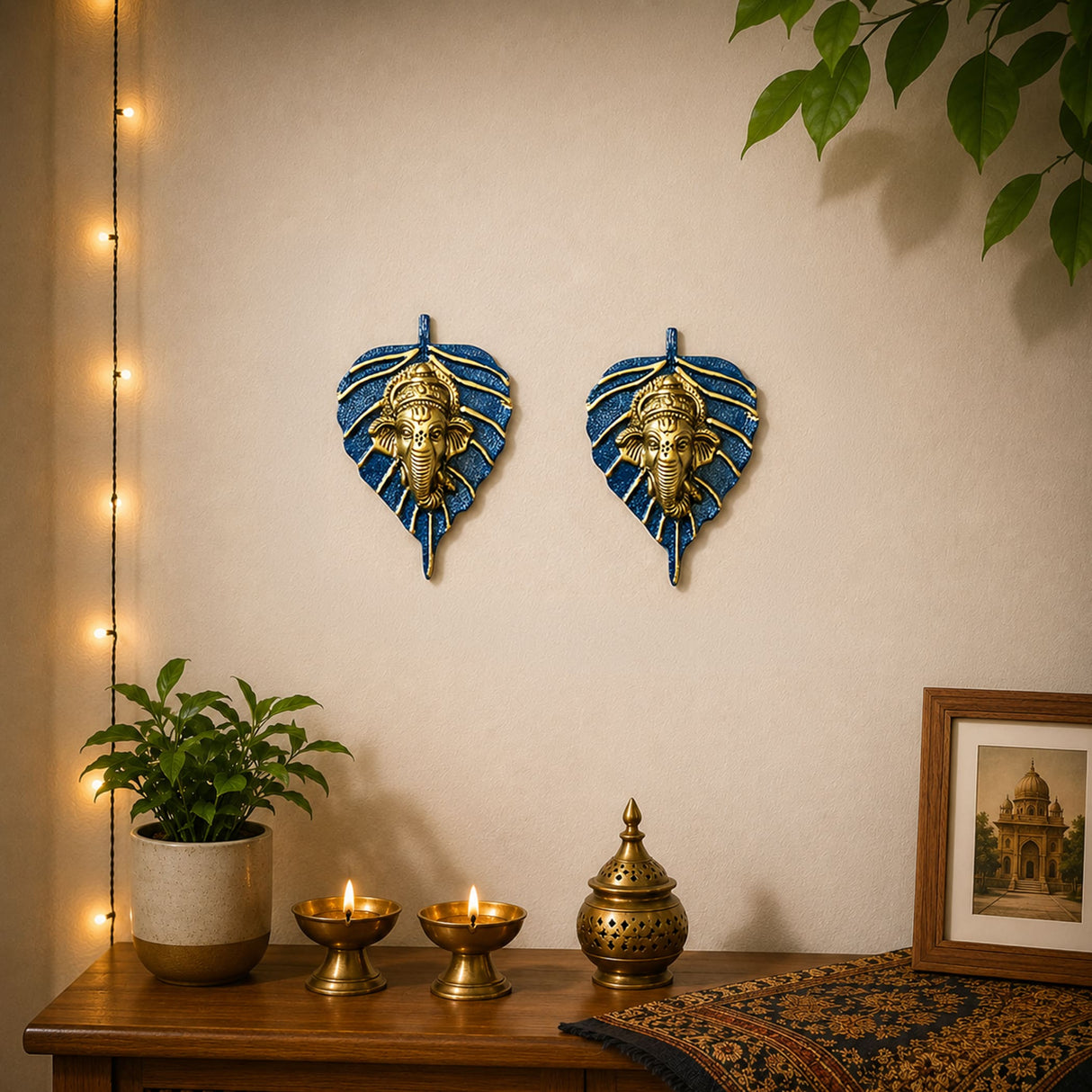Metal leaf ganesha wall hanging decor featuring blue and gold leaf shapes with ganesha figures for home and office