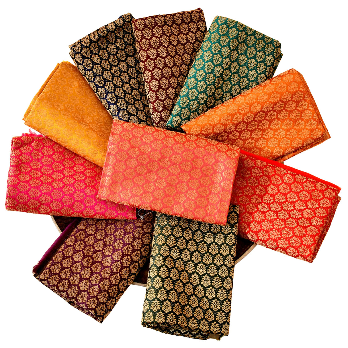 A collection of vibrant multicolor silk unstitched blouse pieces with intricate patterns for saree and Indian return gifts