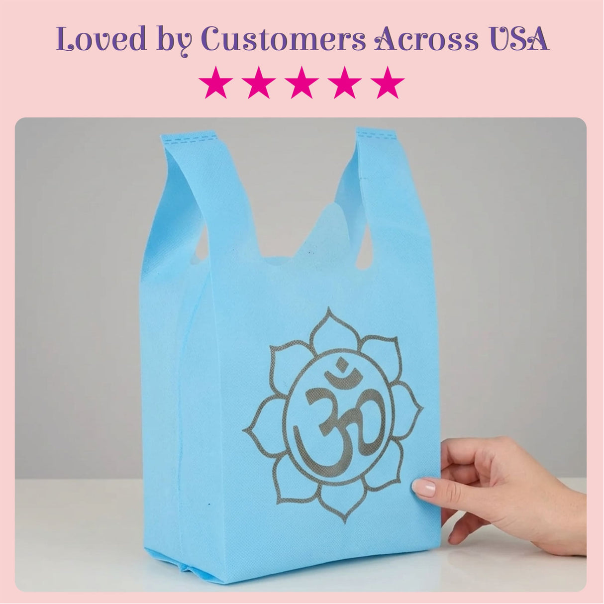 Light blue reusable non woven tote bag with gray om symbol for Indian wedding housewarming puja party favors