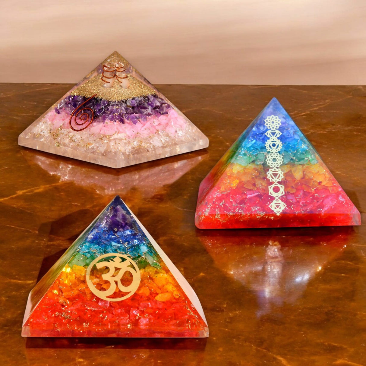 Colorful crystal pyramids for chakra healing meditation and spiritual energy boosting