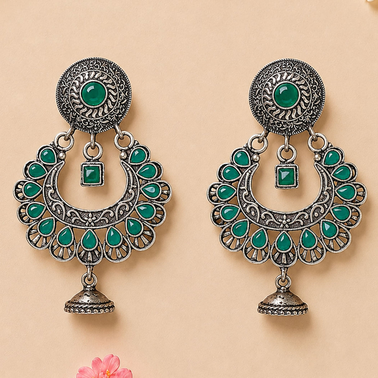 Indian oxidized silver floral chandbali earrings with vibrant green jade stones and intricate filigree for ethnic wear