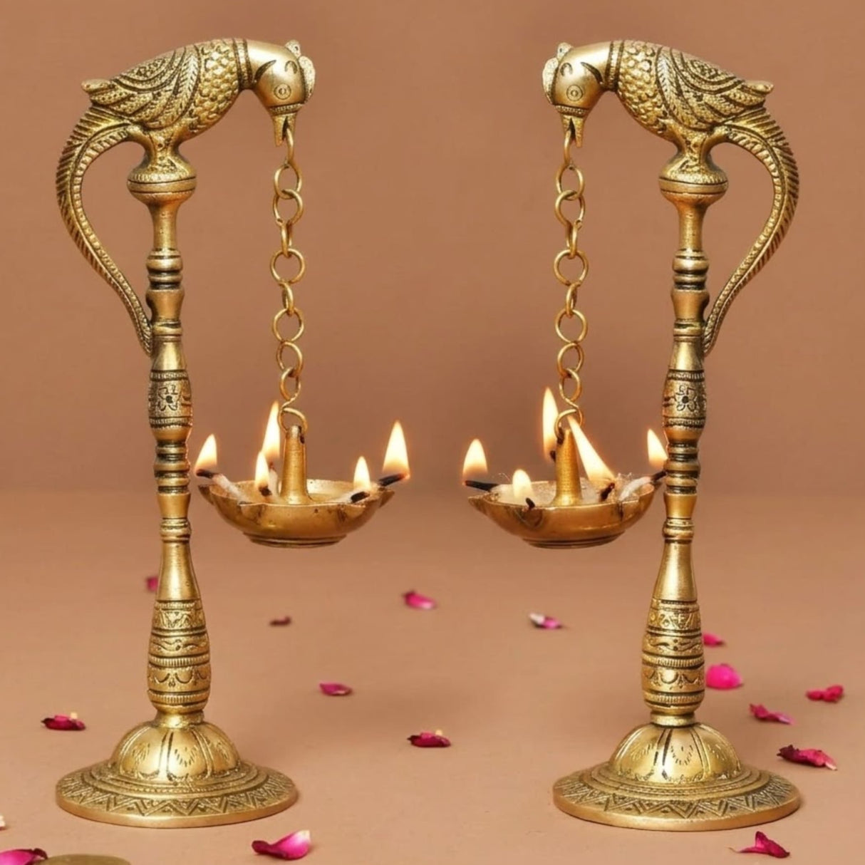 Golden brass 2 pc parrot oil diya with intricate carvings and hanging chains for puja and diwali decor