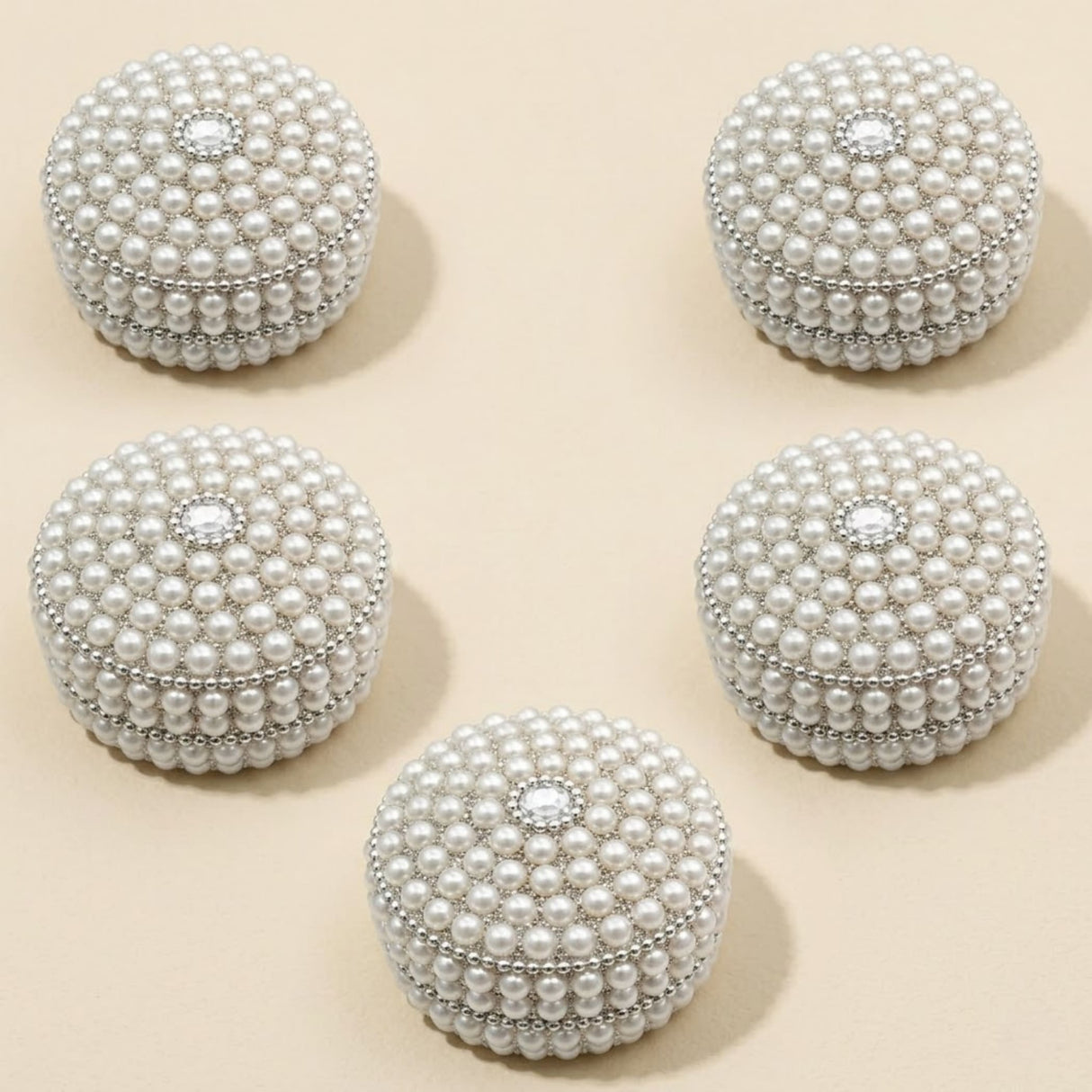 Pearl jewelry box for women with white pearl adornments silver accents and diamond-like centerpiece for travel and gifting