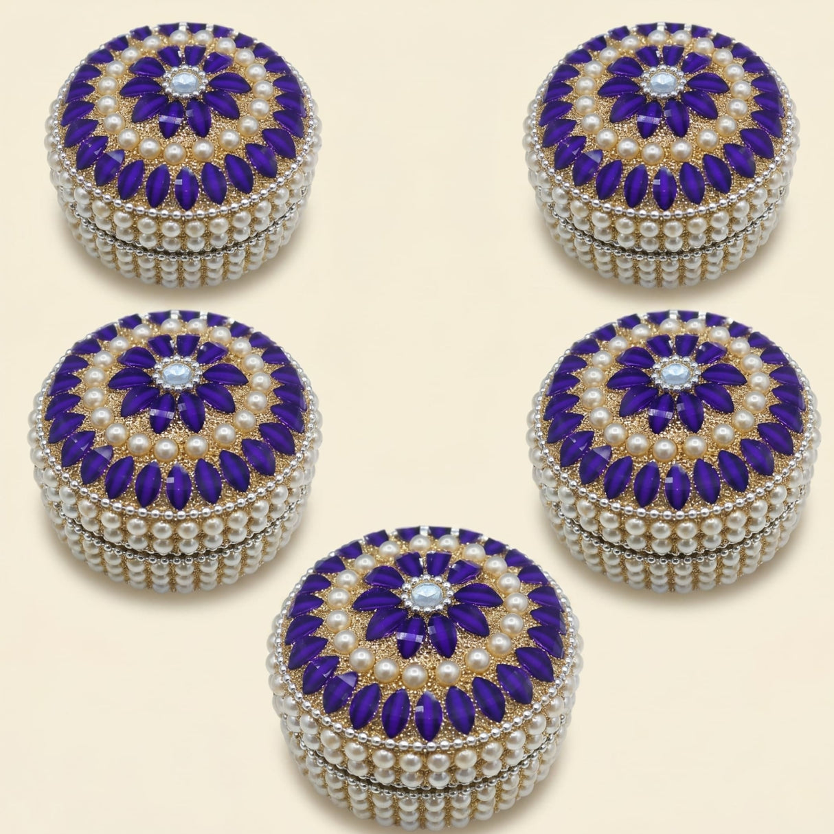 Purple and pearl-embellished circular jewelry box with central blue gemstone for travel and festival gift organizer