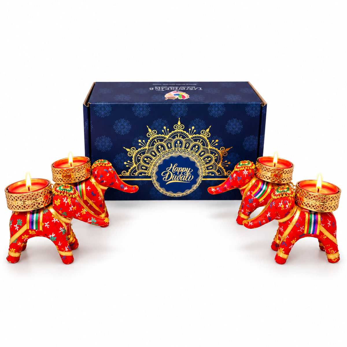 Red and gold elephant-shaped tealight candle holders with intricate embroidery for personalized diwali gifts hamper set