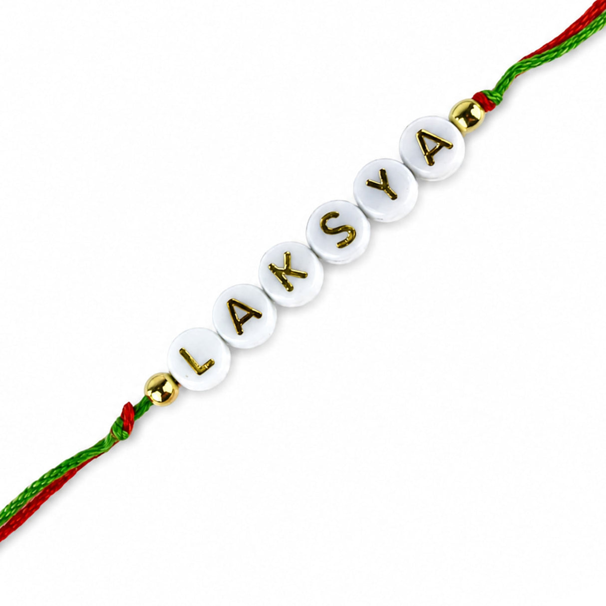 Personalized name rakhi for brother and bhabhi featuring white circular beads with gold lettering on red and green cord