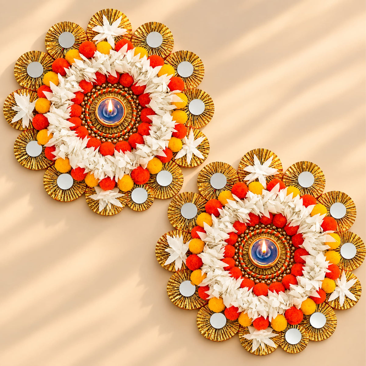 Vibrant orange white and yellow floral mandala rangoli mat tealight candle holder with mirrored gold accents for home decor