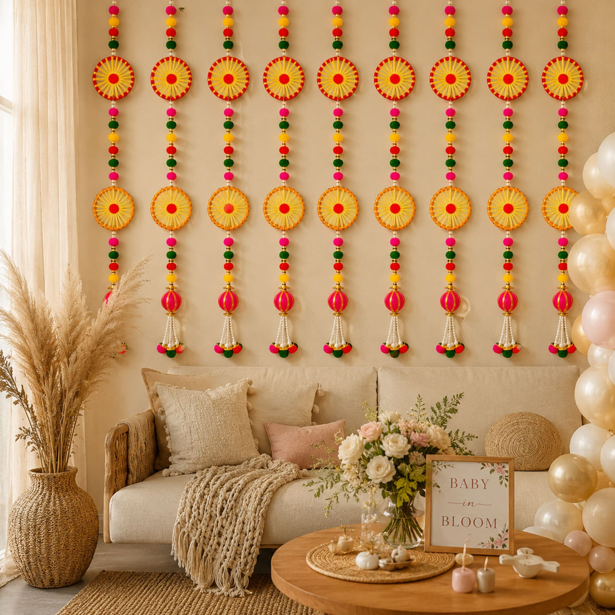 Vibrant yellow and red floral garlands with pink green and gold beads hanging as handmade diwali wall backdrop decor