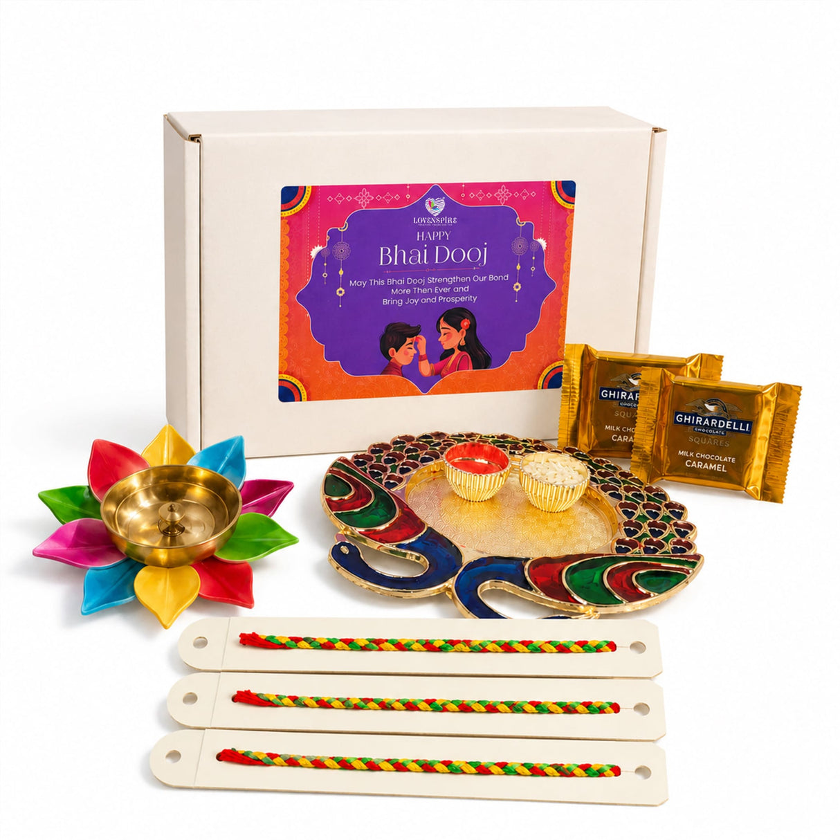 Colorful peacock-shaped enamel and gold tray in Bhai Dooj gift hamper with haldi kumkum holder and rakhi set