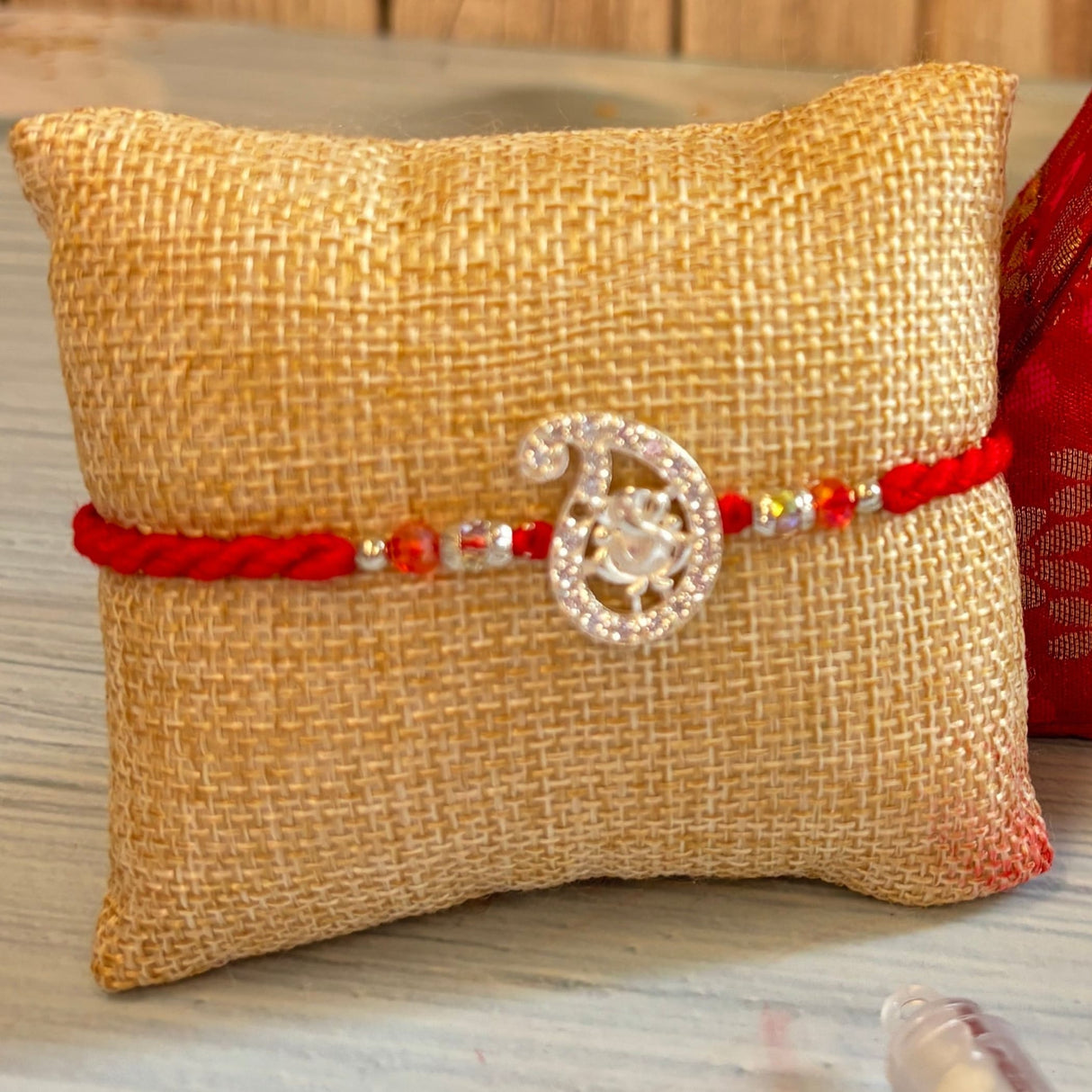 Designer Pure Silver Ganesha Rakhi for Brother – Traditional Bracelet Jewelry for Raksha Bandhan with Brocade Box & Roli Chawal, Symbolizing Good Luck & Protection