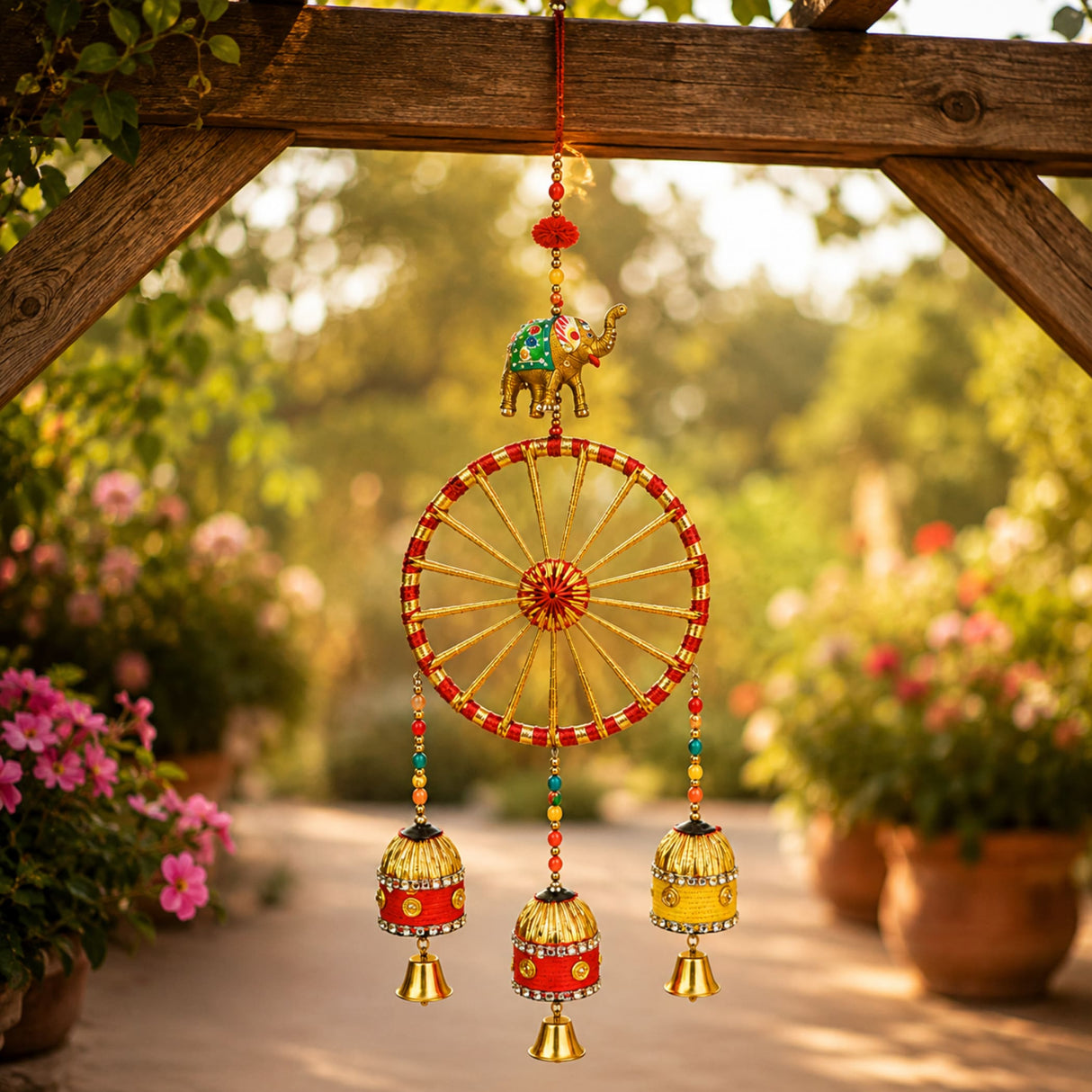 A vibrant handcrafted rajasthani ring elephant wall hanging with gold elephant and colorful bells for home decor