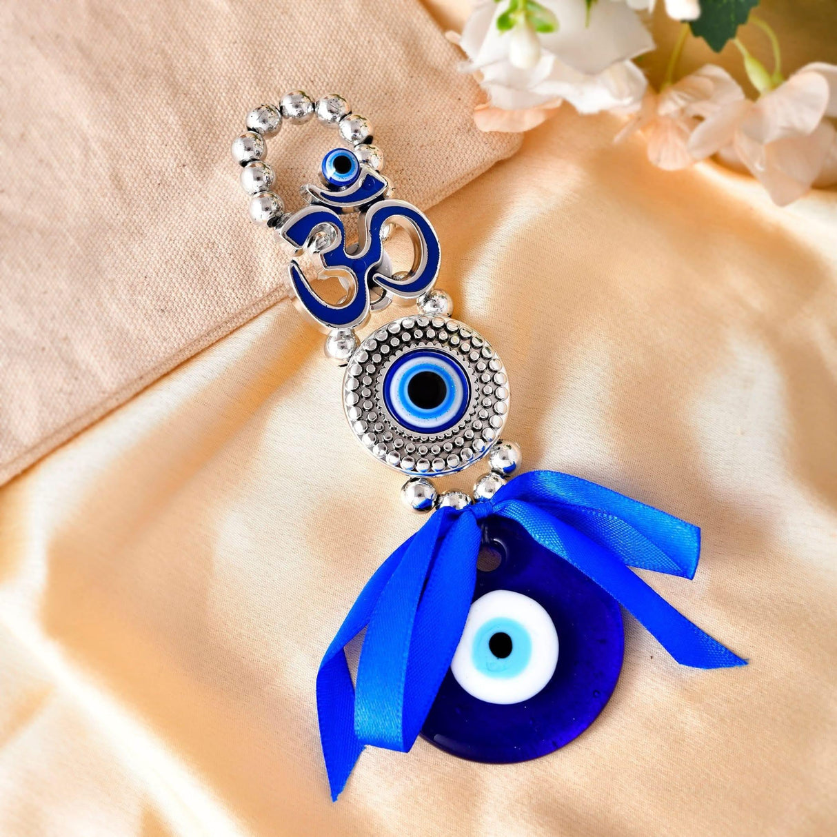 Rakhi Gift Hamper for Brother Set of 2 Rakhi with Om Evil Eye Hanger Haldi Kumkum Holder Roli Chawal Rakshabandhan Card Chocolates with Gift Set - Evil Eye Bracelets for Bhai Bhabhi - LoveNspire