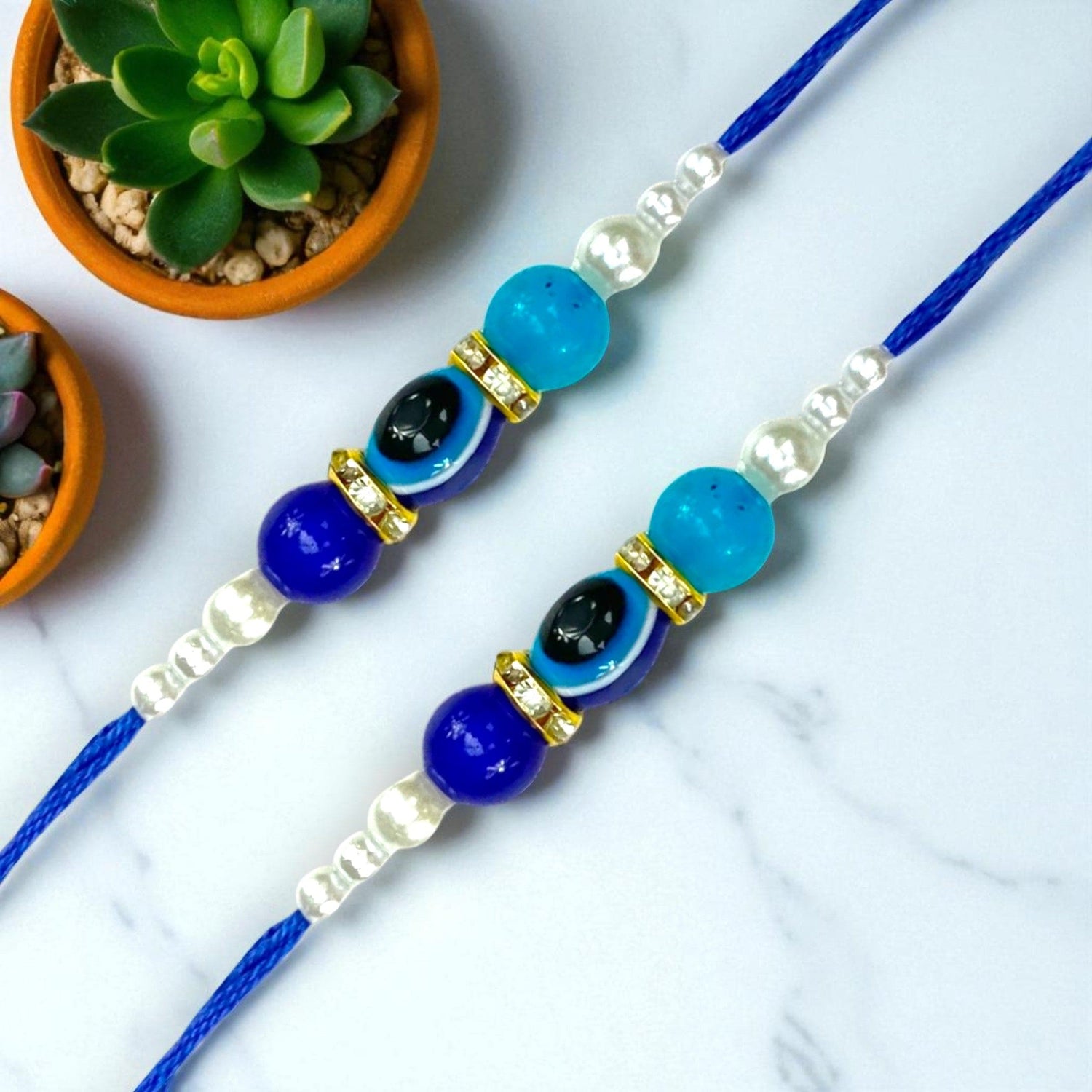 Two blue beaded bracelets included in Rakhi Gift Hamper for Brother and Bhai Bhabhi