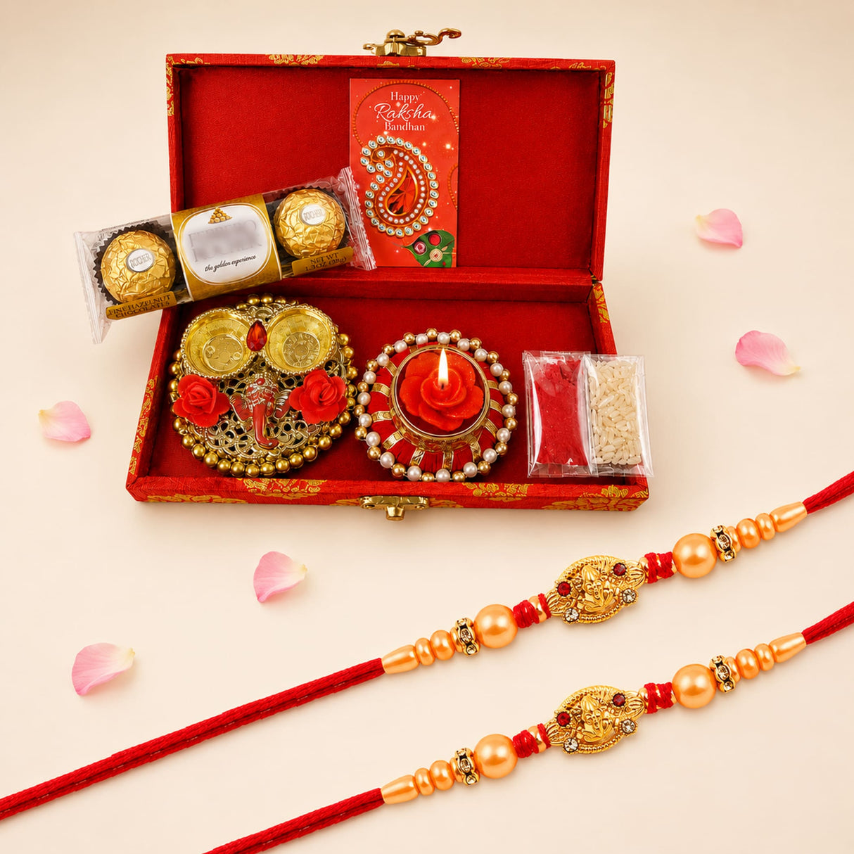 Brocade gift box raksha bandhan hamper in red and gold with two handmade rakhis chocolates candle and haldi kumkum holder