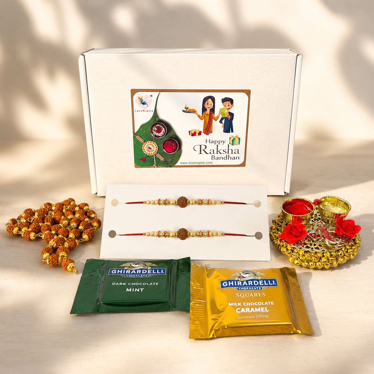 White cardboard gift hamper box featuring cartoon label happy raksha bandhan with green rakhi illustration for brother bhabhi