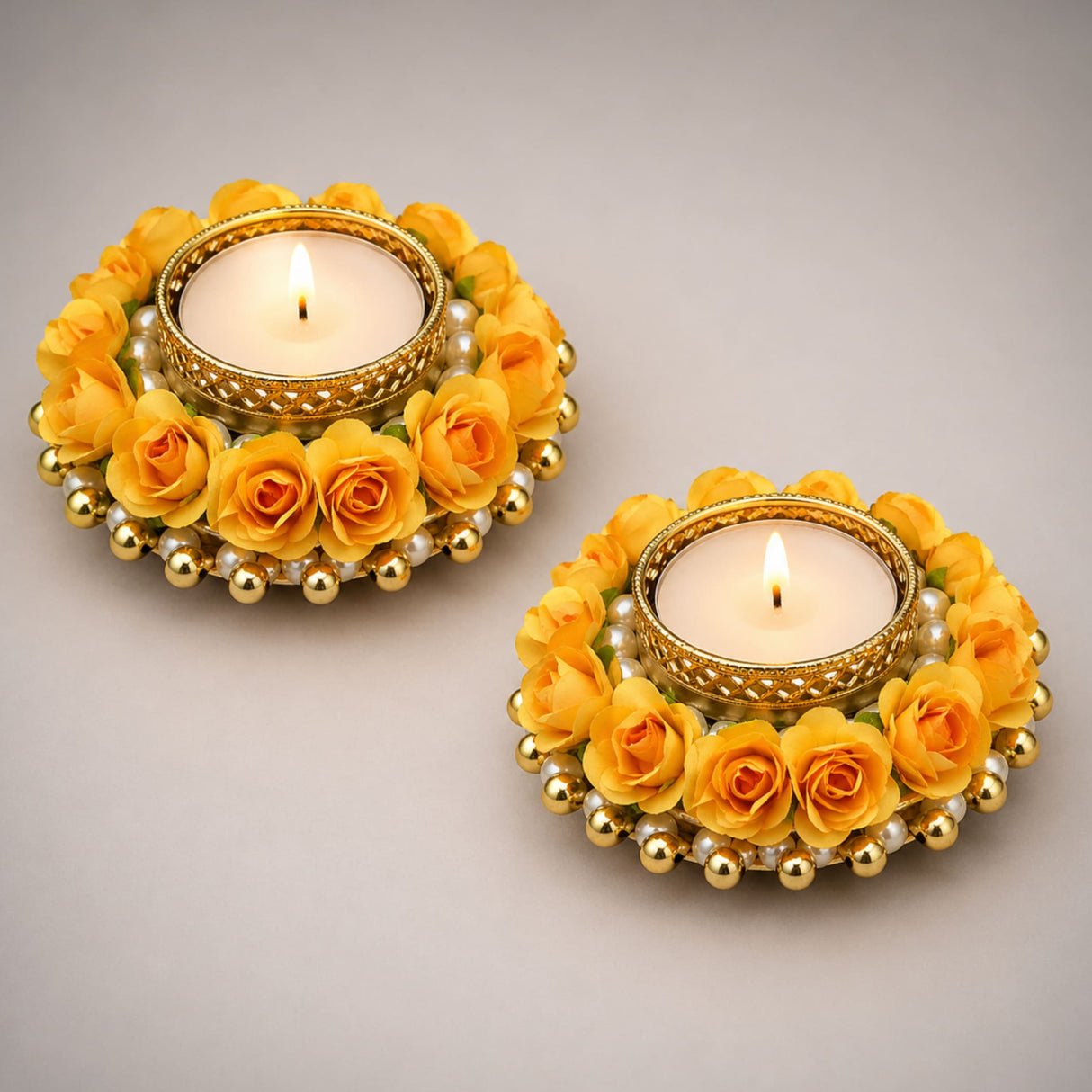 Golden floral tealight candle holders adorned with yellow roses and pearls for festival of light decor and gifts