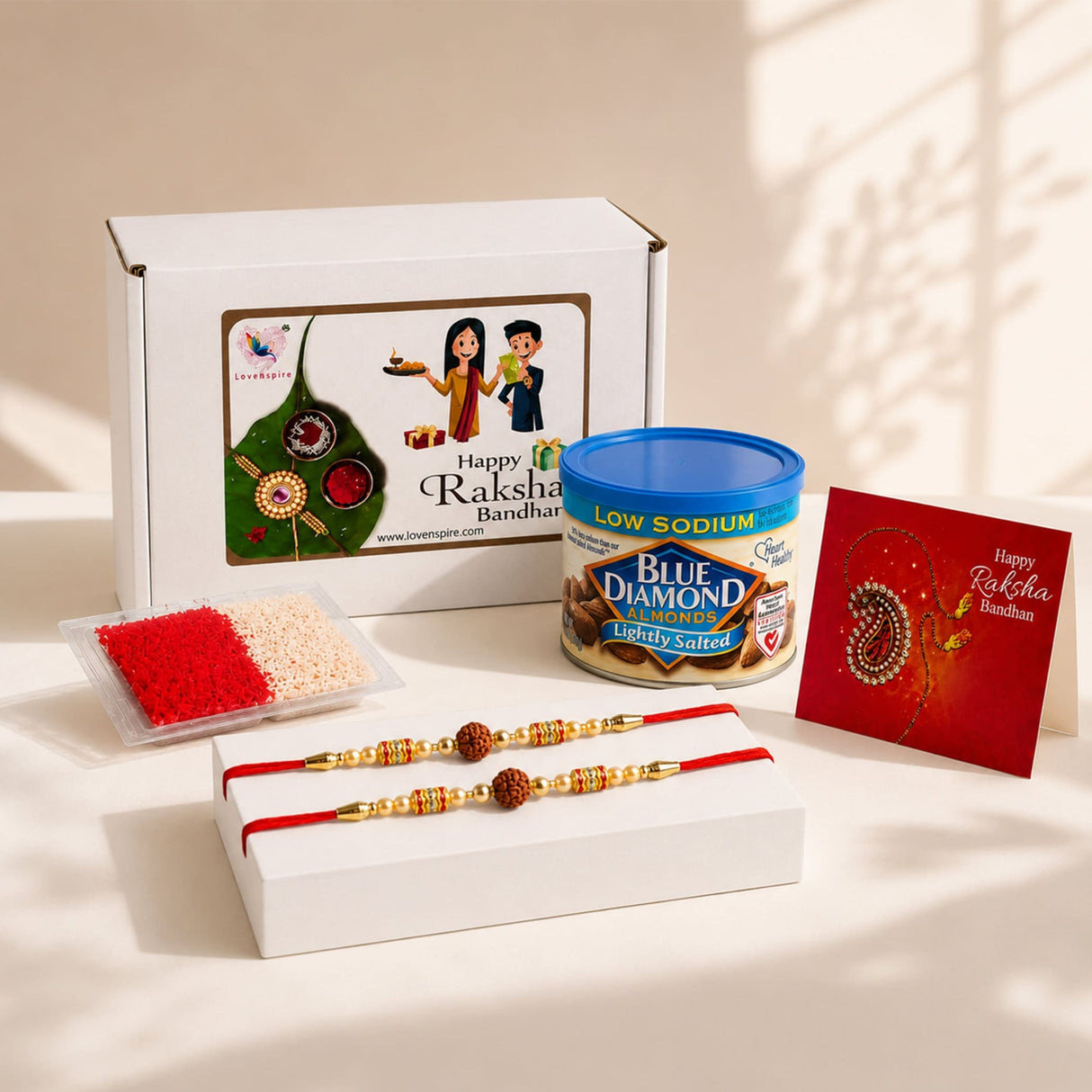 Red and gold threaded rakhi with wooden rudraksha beads from traditional handmade raksha bandhan gift hamper for brother and bhabhi